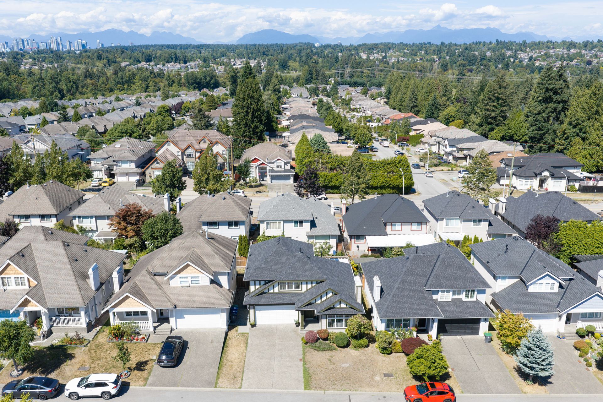 Drone view of the street and nearby homes