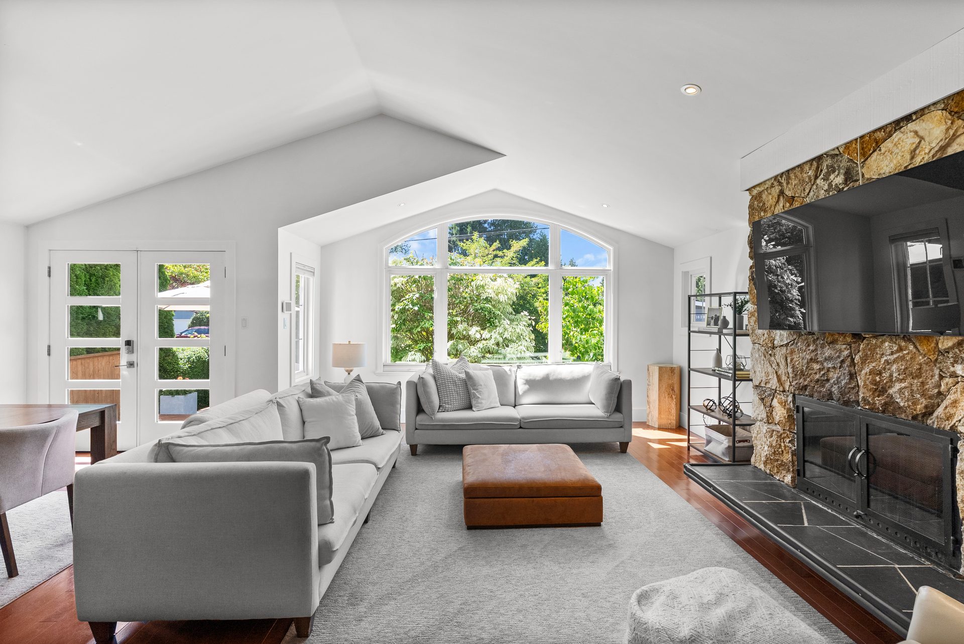 Bright living room with vaulted ceilings